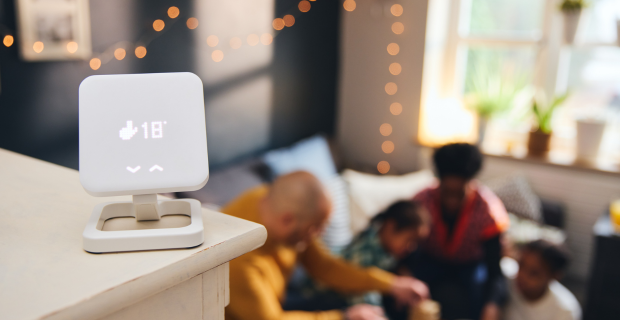 Smart home technology controls energy use through a thermostat, lighting, and mobile app.
